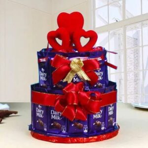 ChocDair Cake featuring Dairy Milk arrangement. Same day online delivery in Karachi. Order now!