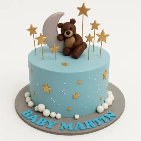 Blue boy baby shower cake with teddy bear, moon, and stars decorations, perfect for celebrations with online cakes delivery in Karachi.