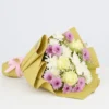 Cream & Clove Bouquet with roses and lavender blooms, wrapped in kraft paper—perfect choice to send flowers to Karachi today.