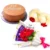 Eid Celebration Treat with chocolate flower bouquet, 1 pair of gajra, and 2 pounds of cake, perfect for Eid gifting in Karachi.